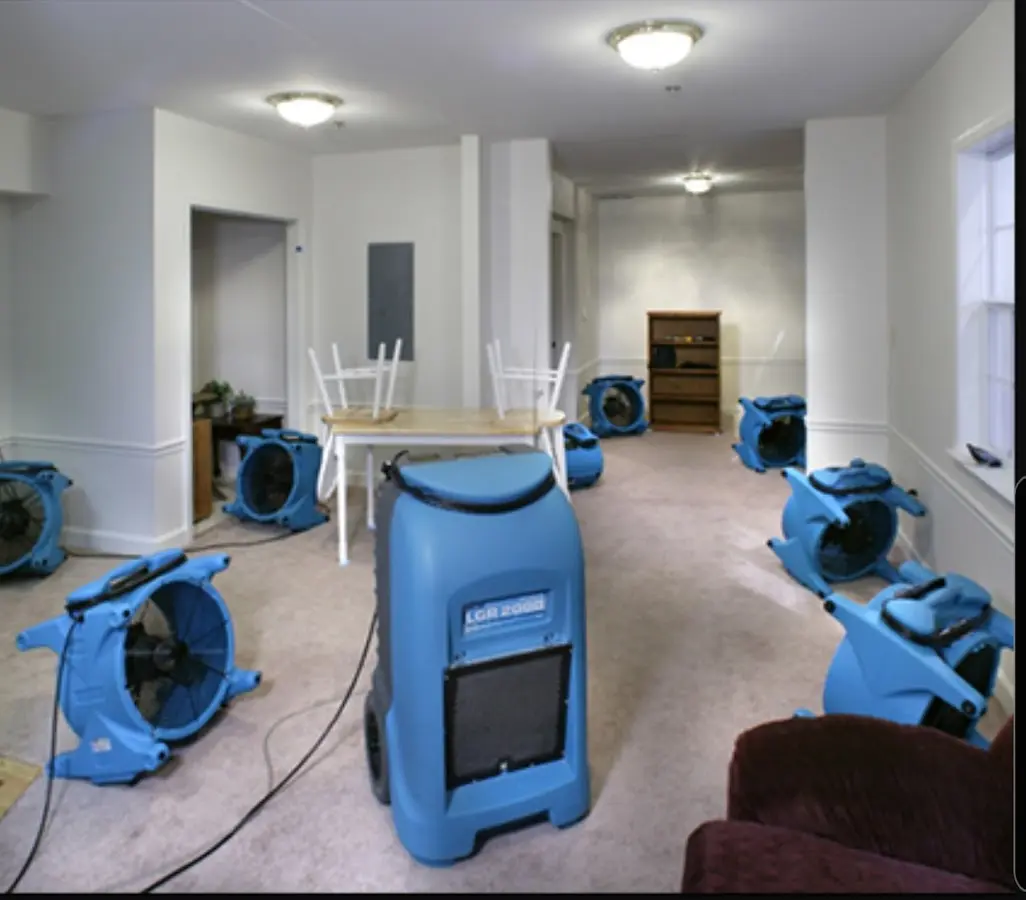 Air movers and dehumidifier setup for Water Damage Restoration in Algoma
